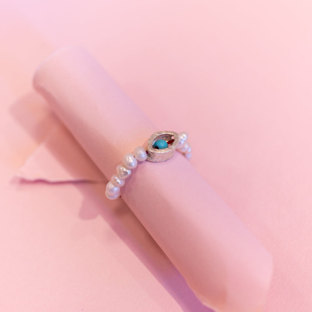 Evil eye with pearl ring